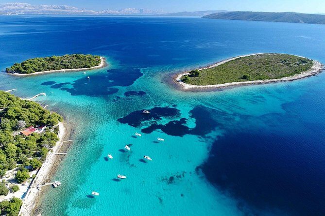 Blue Lagoon, Trogir & Čiovo catamaran tour with Food and Drinks - Morning swim: Blue Lagoon and Krknjasi Bay