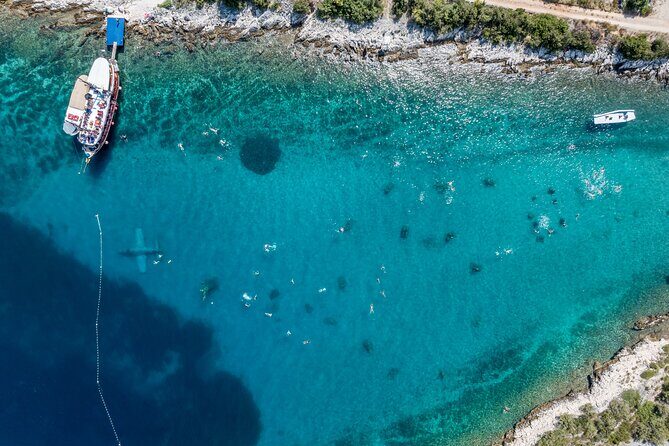 Blue Lagoon & Underwater Museum from Split with Lunch & Drinks - Blue Lagoon hour at Krknjasi Bay: swim, jump, and reset
