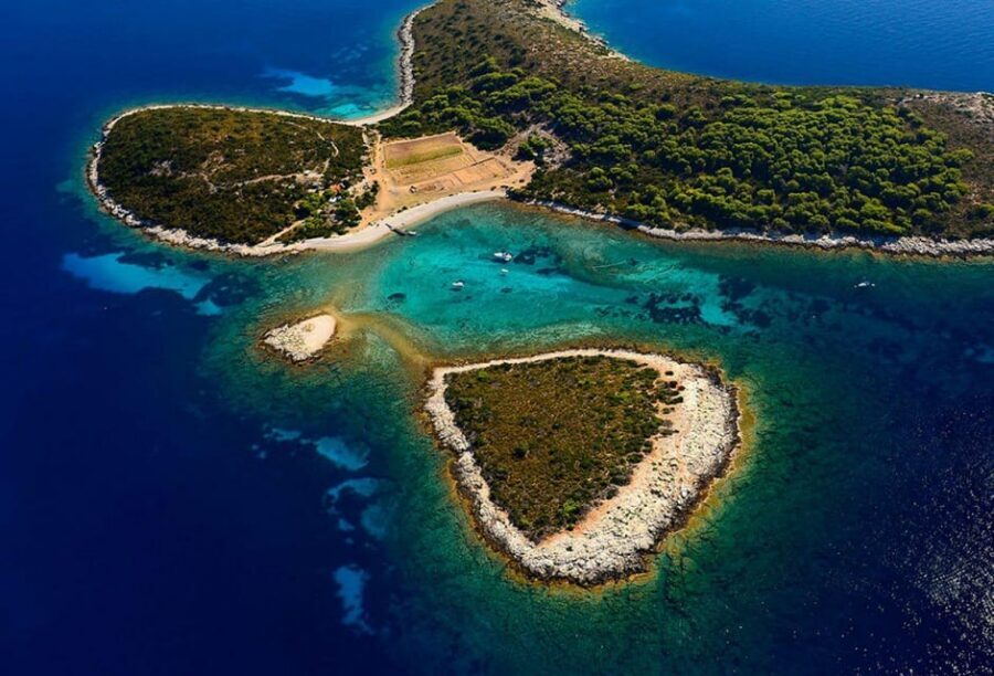 From Hvar: Blue cave group speedboat tour full day - The first water stop: Budikovac Blue Lagoon (swim + snorkel)