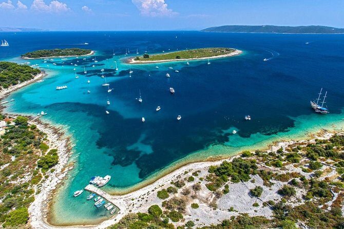 From Split: Half-Day Blue Lagoon and 3 Islands Boat Tour - Trogir stop: a focused hour in an old-town photo maze