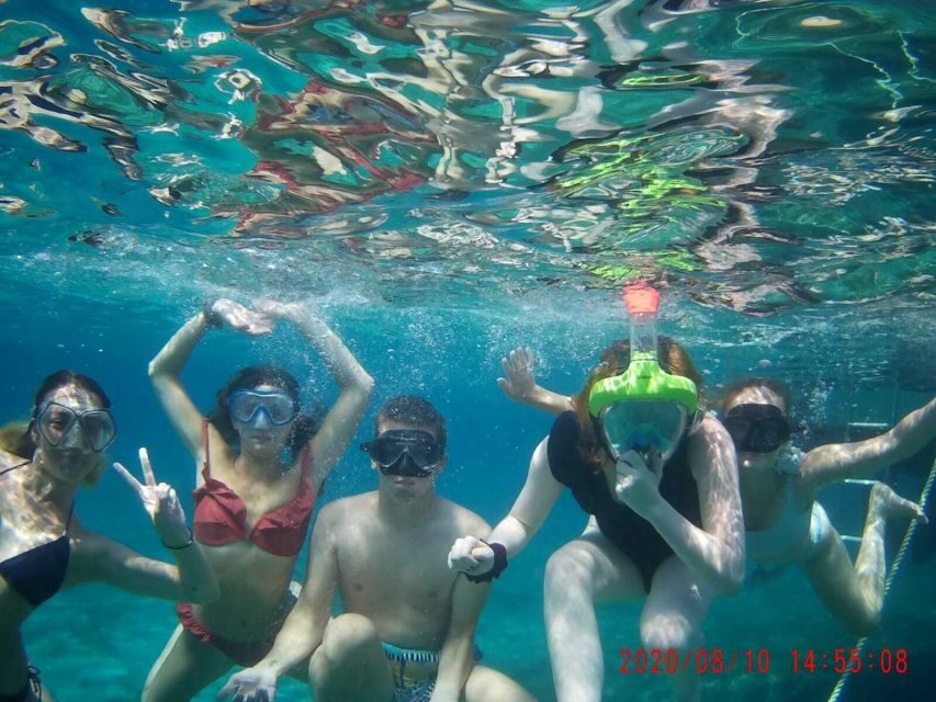 From Split: Luxury Cabin Boat Tour to The Blue Cave and Hvar - Stiniva cove cliffs: drama from the water