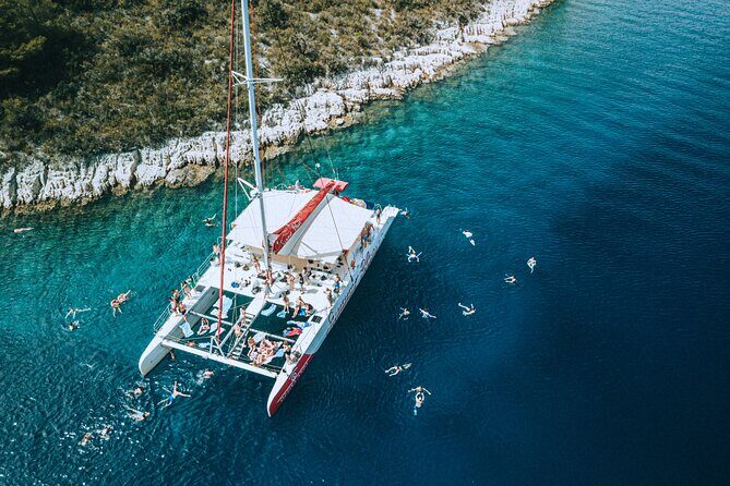 Full-Day Catamaran Cruise to Hvar & Pakleni Islands with Food and free Drinks - Practical Tips for Sun, Swims, and Motion Sickness