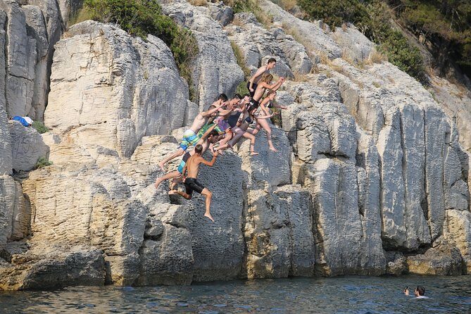 Half-Day Split Sea Kayak Adventure - The Swim and Snorkel Stop (Plus the Optional Cliff-Jump Moment)