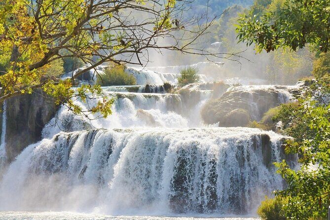 Krka National Park & Primošten Tour from Split or Trogir - Krka National Park: Wooden Paths to Skradinski Buk
