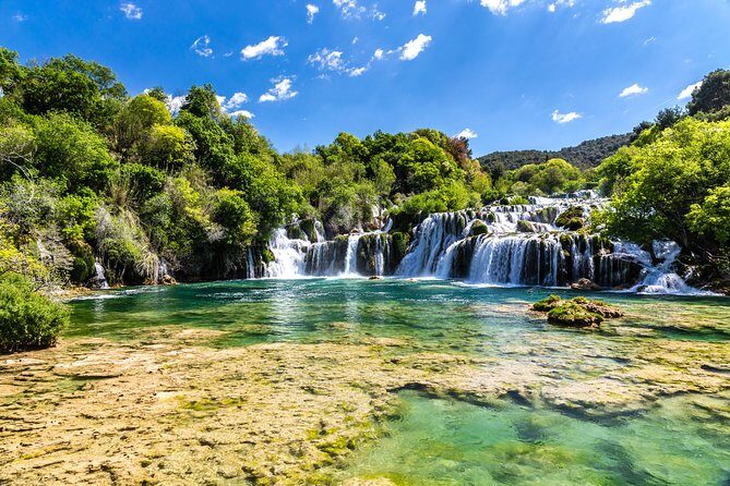 Krka Waterfalls & historic Šibenik - driver&guide, boat cruise, lunch break - Start Time in Split: Pickup, Mobile Tickets, and a Simple Plan