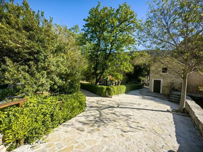 Krka waterfalls tour with lunch from Split - Local village lunch and wine: farm-to-table style with a real stop
