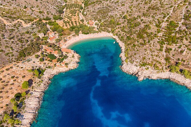 Red Rocks Private All Day Tour from the City of Hvar - Ivan Dolac and Dubovica Beach: swimming with vineyards in the background