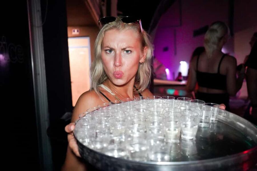 Split: Boat Crawl with Nightclub Access, Shots, & Boat Party - The warm-up stop: drinking games, social energy, and your first shot
