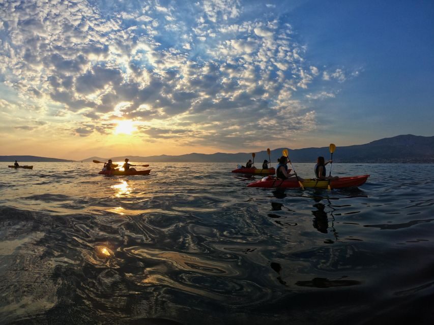 Split: Guided Sunset Sea Kayaking & Snorkeling Tour - Entering the Water at Bene Beach in Split