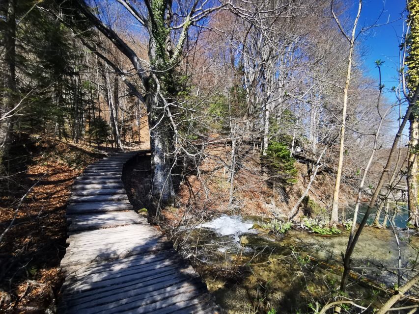 Split: Plitvice Lakes Guided Day Tour with Entry Tickets - Upper Lakes on wooden trails: quiet power and better group flow