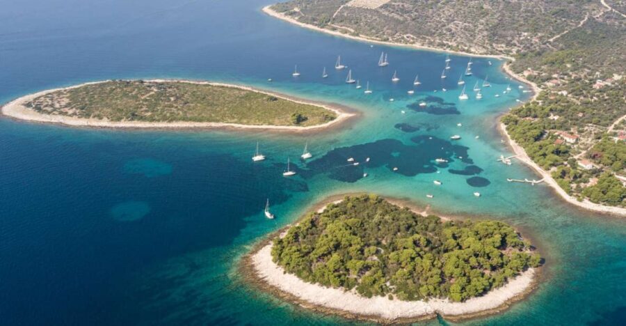 Split: Private Full Day Boat Trip to Blue Lagoon and Trogir - Blue Lagoon morning swim: crystal water and fewer crowds