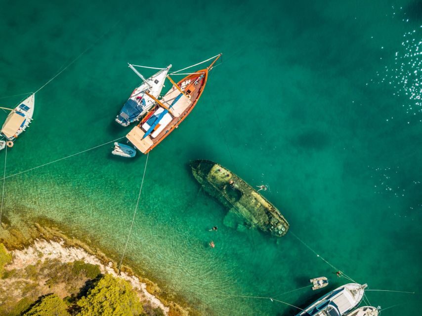 Split: Private Full Day Boat Trip to Blue Lagoon and Trogir - Sunset sailing back to Split, plus dolphin hopes