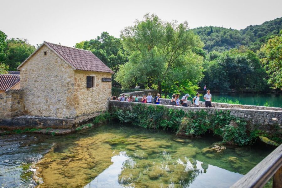 Split/Trogir: Krka National Park Day Trip with Wine Tasting - Entering the Water: Skradinski Buk and the Walk That Matters