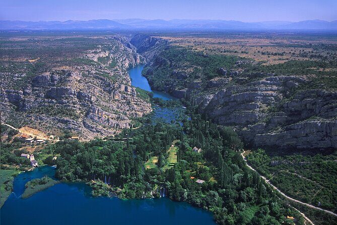 The Wonder of nature route - Panoramic Flight over Plitvice Lakes & Krka NP - Over Velebit Slopes and the Lika Region: The Scenic Bridge