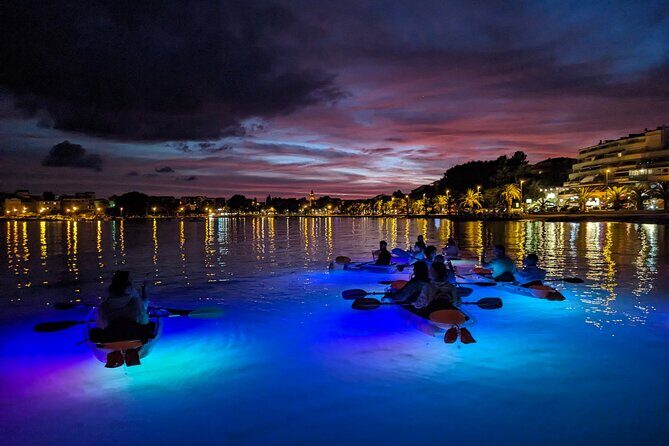 Transparent Kayak Glow Tour in Split - Stop 3 to Stop 4 Transition: White Rocks, Cliffside Houses, and a Small Beach Pause